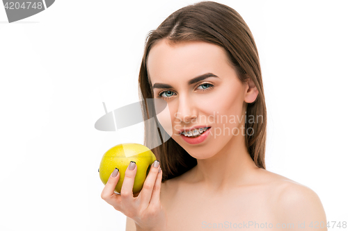 Image of Beautiful young woman with teeth braces