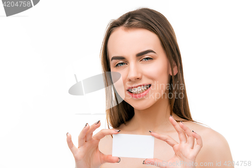 Image of Beautiful young woman with teeth braces