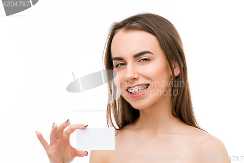 Image of Beautiful young woman with teeth braces