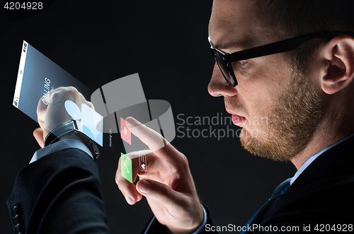 Image of close up of businessman with smartwatch