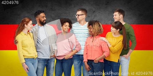 Image of international group of people over german flag