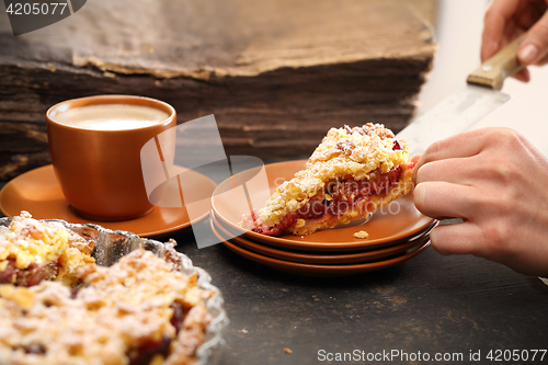 Image of Cake with plums. Homemade pastries. Homemade cake with fruit.