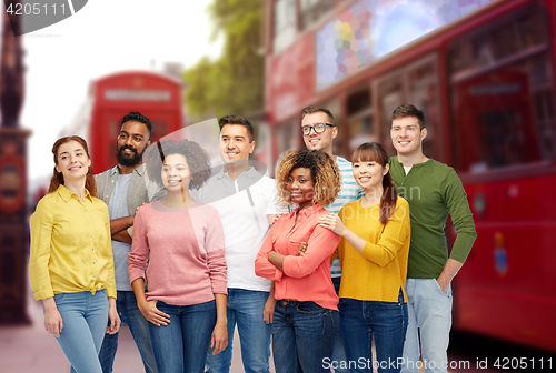 Image of international group of people over london city