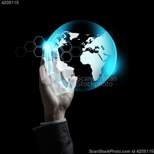 Image of close up of businessman hand with earth projection