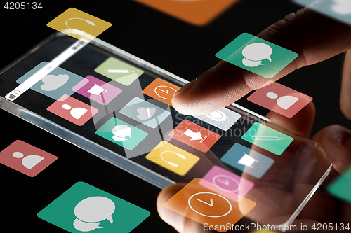 Image of close up of businessman hand with glass smartphone