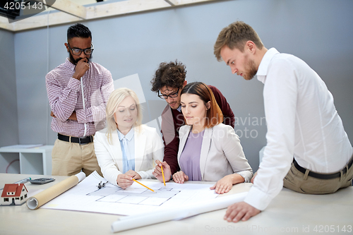 Image of business team discussing house project at office