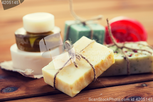 Image of close up of handmade soap bars on wood