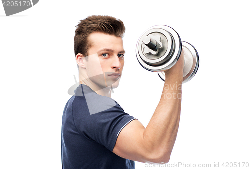 Image of sportive young man with dumbbell