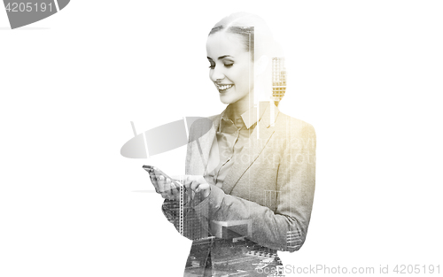 Image of young smiling businesswoman with smartphone