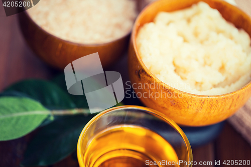 Image of close up of body scrub in wooden bowl