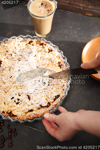 Image of Cake with plums. Homemade pastries. Homemade cake with fruit.