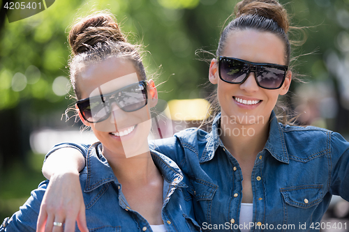 Image of twin sister with sunglasses