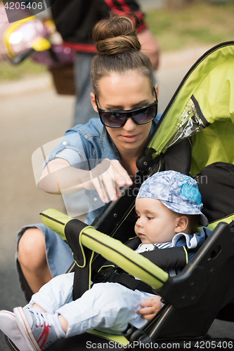 Image of mother and baby in the park