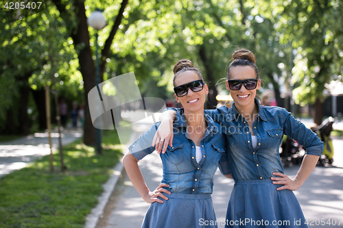 Image of twin sister with sunglasses