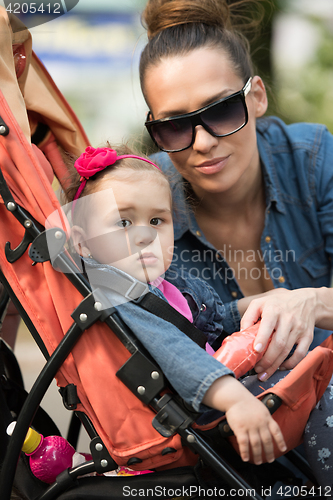 Image of mother and baby in the park