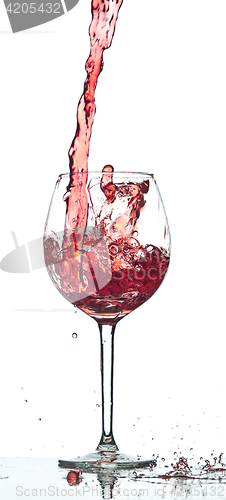 Image of Red wine splash over white background