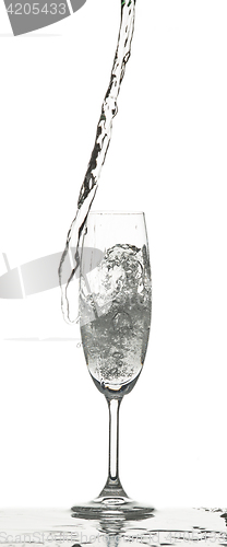 Image of The water splashing to glass on white background