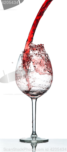 Image of Red wine splash over white background