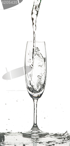 Image of The water splashing to glass on white background