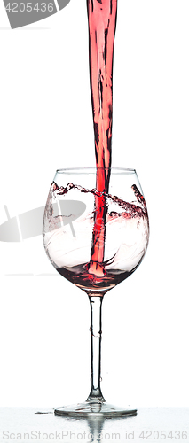 Image of Red wine splash over white background