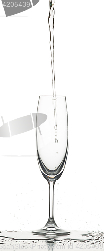 Image of The water splashing to glass on white background