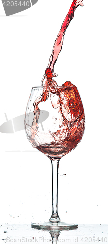 Image of Red wine splash over white background