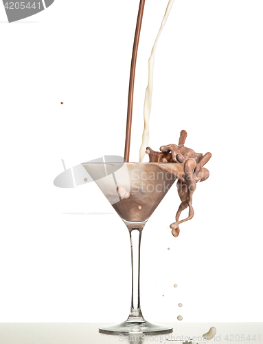 Image of macro shoot with hot chocolate falling in glass on white in studio