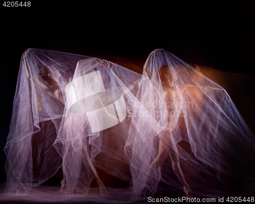 Image of The sensual and emotional dance of beautiful ballerina