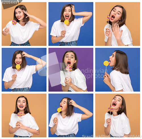 Image of young woman with the colorful lollipop at studio