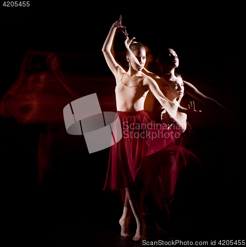 Image of The sensual and emotional dance of beautiful ballerina