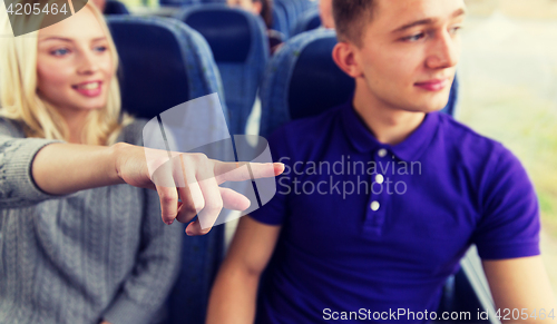 Image of close up of young couple driving in travel bus