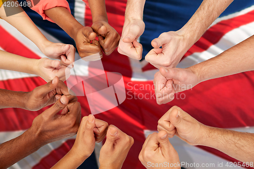 Image of hands of international people showing thumbs up
