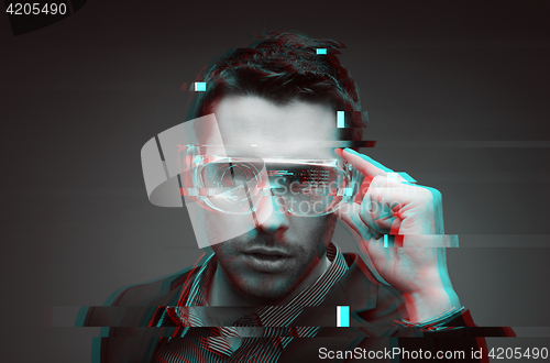 Image of man in virtual reality or 3d glasses with glitch