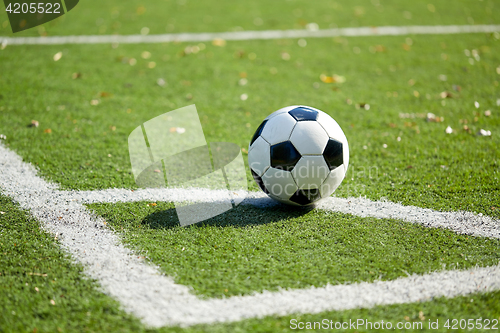 Image of soccer ball on football field