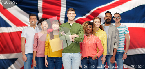 Image of group of international people over english flag