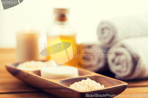 Image of close up of soap, himalayan salt and scrub in bowl