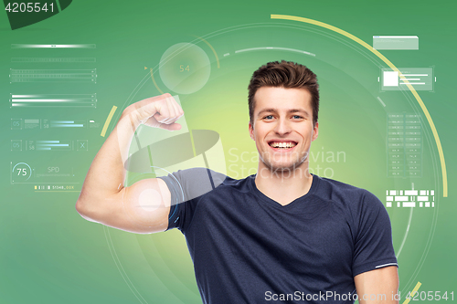 Image of sportive man showing bicep power