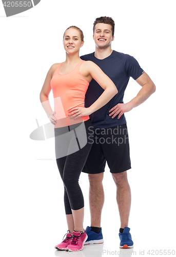 Image of happy sportive man and woman