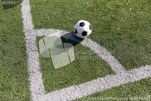 Image of soccer ball on football field