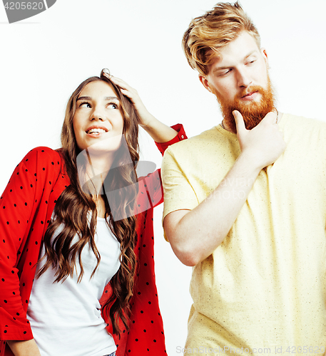 Image of young pretty teenage couple, hipster guy with his girlfriend happy smiling and hugging isolated on white background, lifestyle people concept 