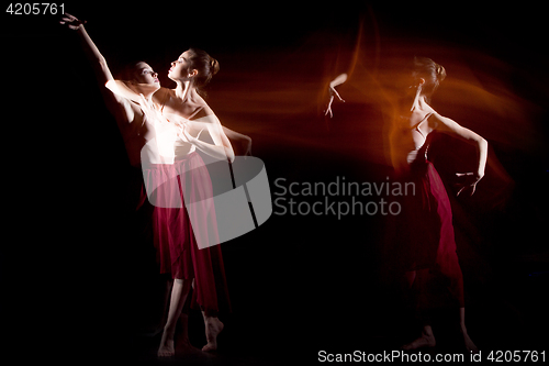 Image of The sensual and emotional dance of beautiful ballerina