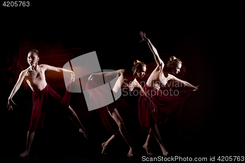 Image of The sensual and emotional dance of beautiful ballerina