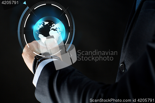 Image of close up of businessman hand with smartwatch