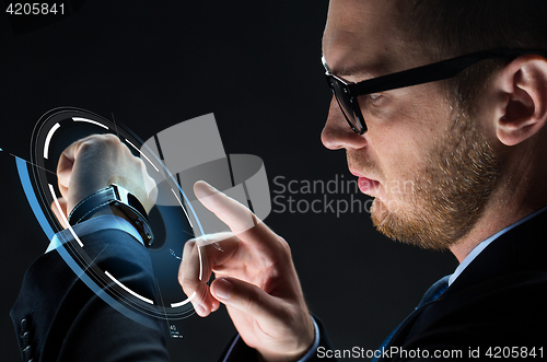Image of close up of businessman with smartwatch