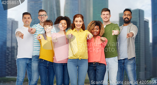 Image of international group of people pointing on you