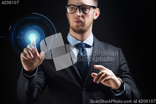 Image of close up of businessman with virtual projection