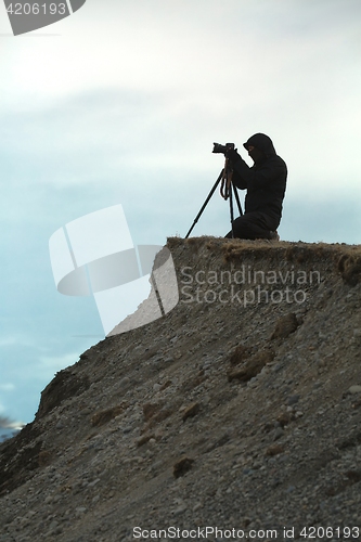 Image of Photographer with tripod