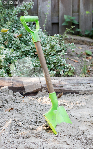 Image of Little shovel in the sand