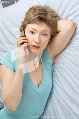 Image of young woman with mobile phone