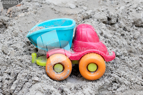 Image of Children\'s machine in the sand